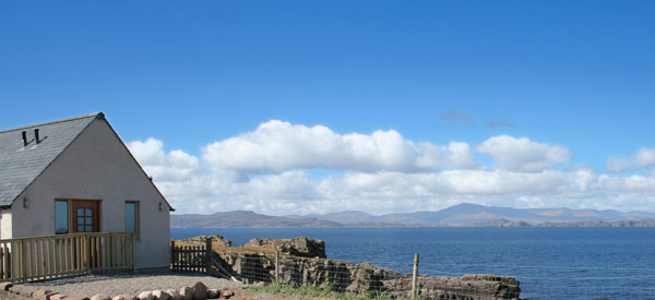 Holly's House self catering cottage and the view to the islands of Rona and Raasay